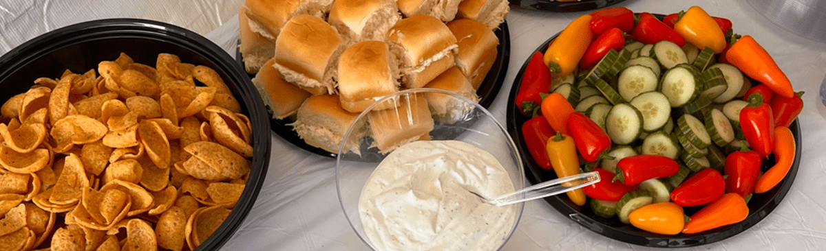 Catering trays with meats, cheeses, and vegetables by AHEAD Catering in Bossier City, Louisiana.
